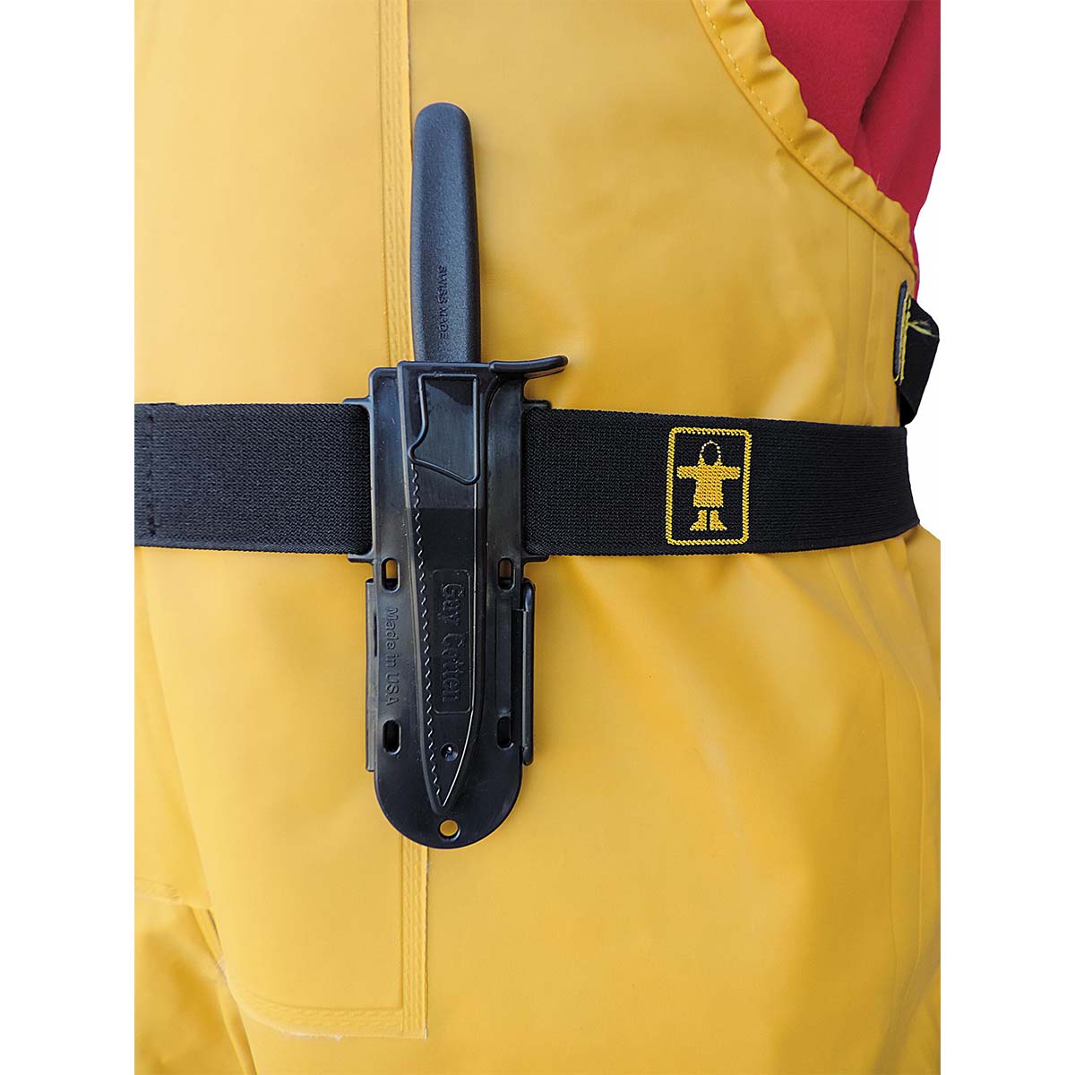 Black knife sheath worn on elastic belt on Guy Cotten fishing bib & braces with a red jacket background, compatible with Victorinox 6.7433 knife